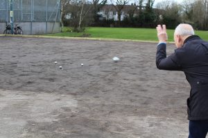 Burgess Hill petanque rink with a player throwing a ball